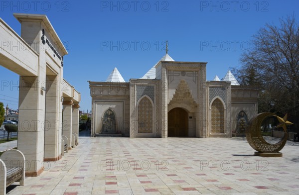Historic building with Islamic architecture under blue sky, Istiklal Harbi Sehitleri Abidesi,