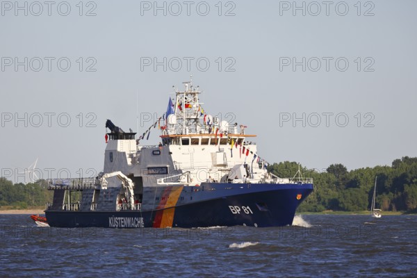Decorated ship of the German Coast Guard and Federal Police BP 81 Potsdam leaves the Port of