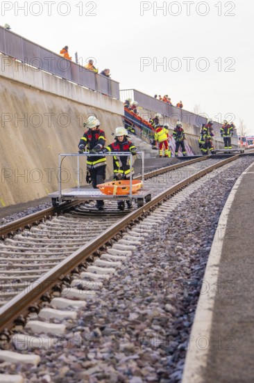 Fire drill with rescue equipment along a railway line, team deployment, fire brigade exercise on