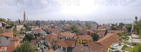 Panoramic view of a city Antalya cityscape with red roofs and historic buildings, Antalya, Turkey