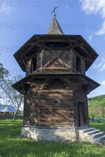 Wooden bell tower near the Church of the Exaltation of the Cross, Patrauti Moldavian monastery from