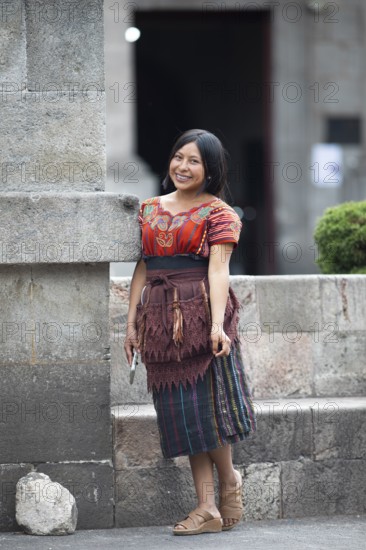 Mayan woman from the K'iché people in traditional dress, Parque Centroamérica or Parque Central,