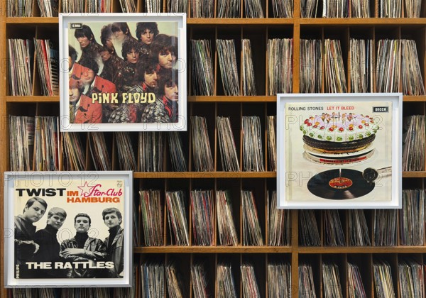 Records by Pink Floyd, the Rattels and the Rolling Stones with more records on the shelf, former