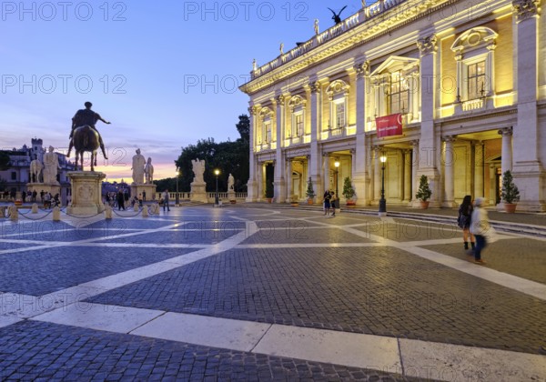 Equestrian statue of Marcus Aurelius and illuminated Palazzo Nuovo at the blue hour, Piazza del