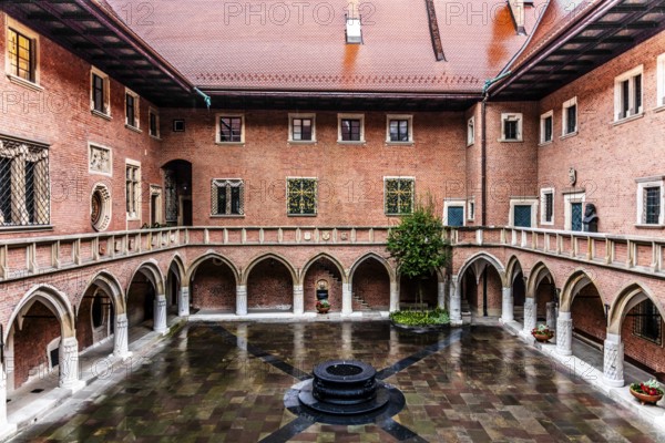 Arcade courtyard with fountain, Collegium Maius oldest building of the Jagellonian University,