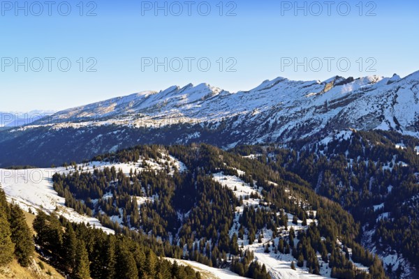 View of the snow-covered Churfirsten mountains from Gulmen, Amden, Canton of St. Gallen,