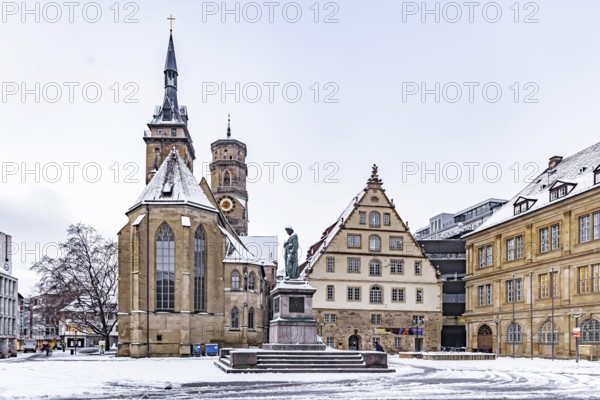 Winter in Stuttgart. The city is wintry white early in the morning. Schillerplatz with collegiate