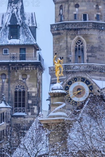 Winter in Stuttgart. The city is wintry white early in the morning. Collegiate church with