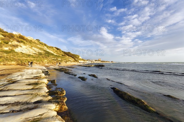 Walkers on the beach, Lido Scala dei Turchi, Realmonte, Agrigento, Sicily, south coast,