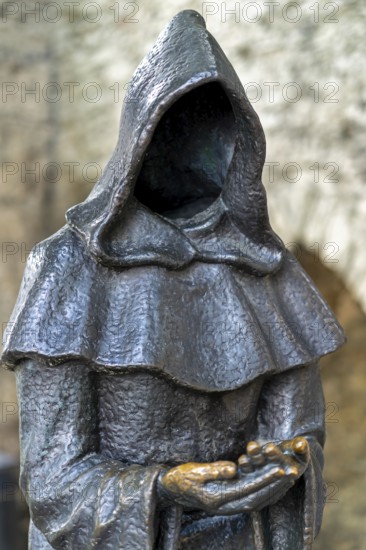 Monk sculpture, one of three bronze statues of faceless monks at the Danish King's Garden in the