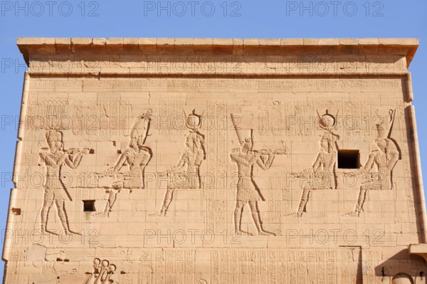 Relief of the king in front of the gods Osiris and Isis, Temple of Philae, UNESCO World Heritage