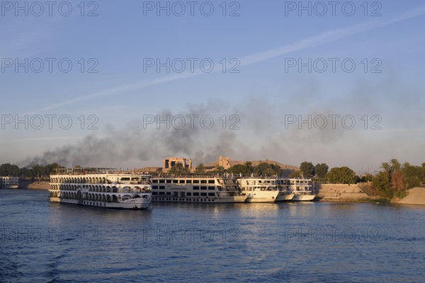 Nile cruise ships at the pier at the double temple of Kom Ombo, Kom Ombo, Egypt