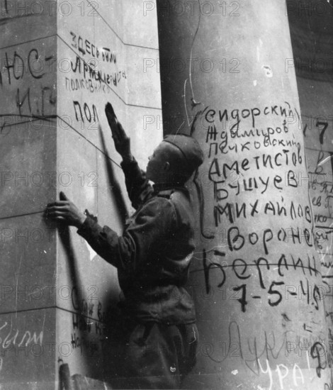 Inscription, graffiti, a Red Army man writes his name on the wall at the Reichstag, early May 1945,