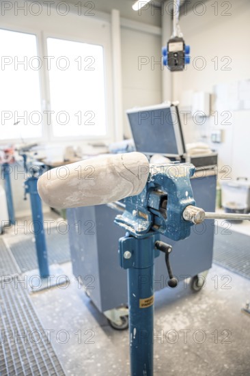 Workbench with plaster model for prosthesis production in a bright environment, medical supply
