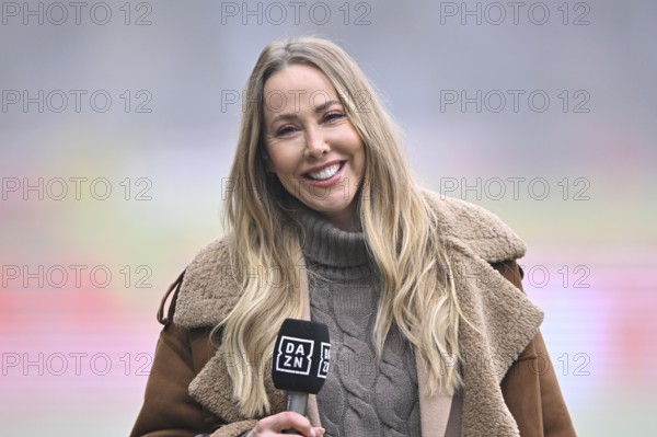 DAZN presenter interviewed microphone micro logo smiling portrait soccer Bundesliga, Voith-Arena,