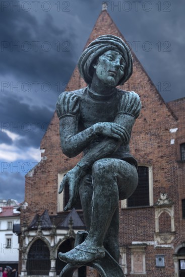 Fountain by Jan Budzillo, figure of a student, copy of a figure from the Marian Altar, Main Market