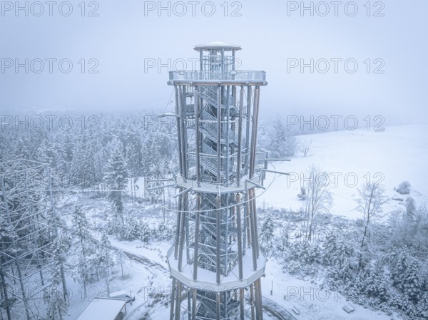 An observation tower in winter fog over a snowy environment, Himmelsglück observation tower with