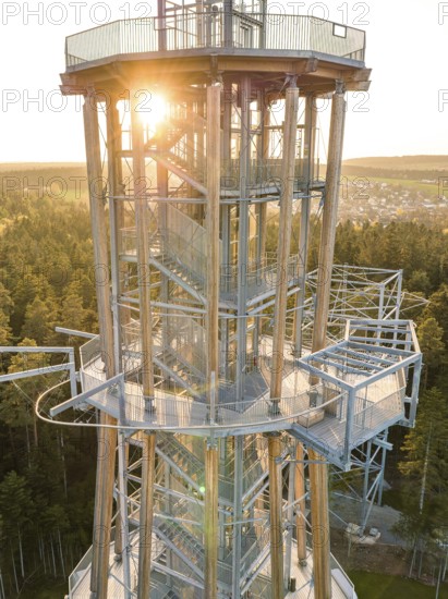 Tower in evening light, sun rays breaking through the metal structure, Himmelsglück observation