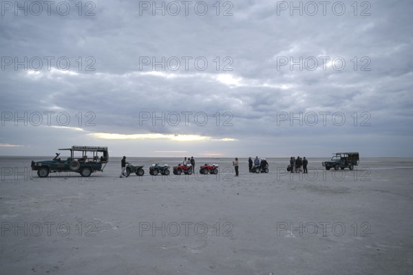 Tourists on a quad bike tour to the Makgadikgadi Salt Pans, Makgadikgadi Pans National Park, Gweta,