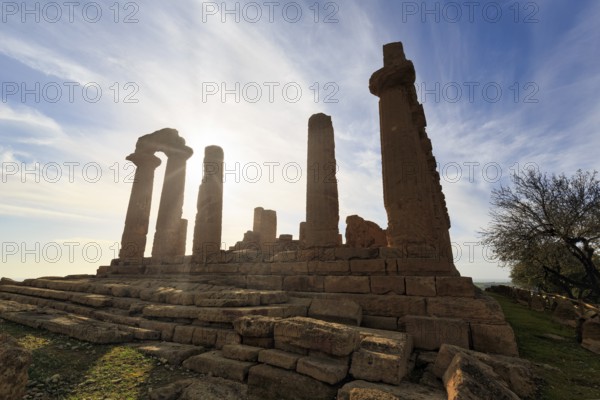 Temple of Heracles, ruins in the Valley of the Temples, restoration, backlight, sunbeams, Valley of