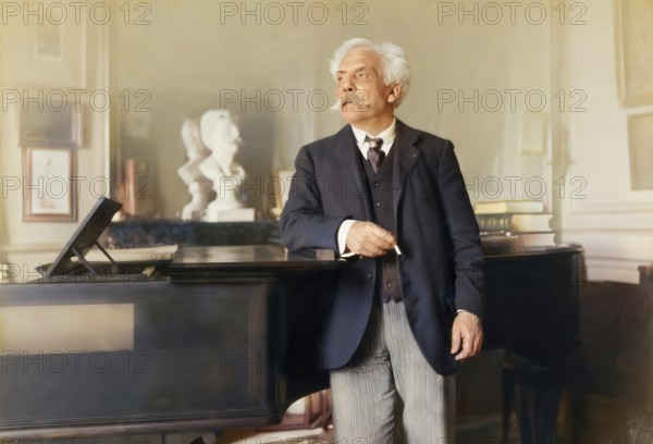 Gabriel Fauré, 1845 – 1924, French composer, next to his piano in his appartement, Boulevard