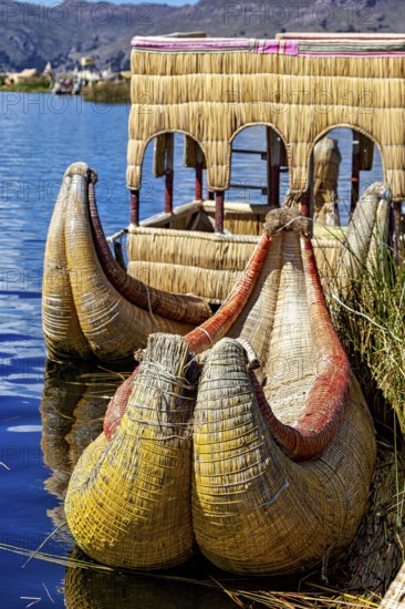 Traditional boats made of reeds on a lake, handmade, The floating reed islands of the Uros in Lake