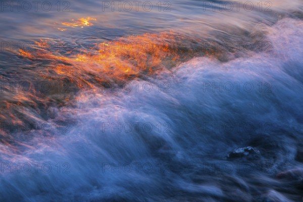 Wave play at sunrise on the chalk coast in Jasmund National Park, Rügen, Sassnitz,
