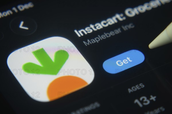 Dhaka, Bangladesh- 01 Dec 2025: A close-up of the Instacart app icon in the App Store on an iPad