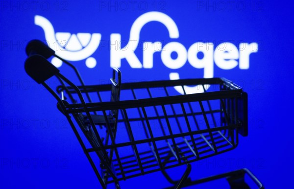 Dhaka, Bangladesh- 03 July 2025: Silhouette of a shopping cart in front of the Kroger logo,
