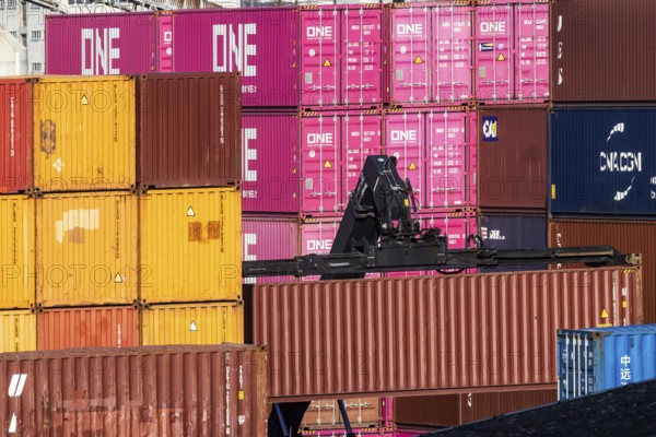 Colourful sea containers in the container port. The port of Mannheim is one of the most important