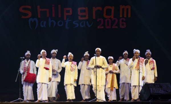 Artists perform 'Ojapali' folk song during a cultural evening program at Shilpgram Mohotsav 2026 in