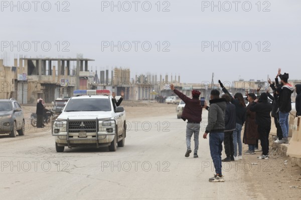 In Raqqa, Syria on January 17, 2026, local civilians are seen welcoming Syrian Army soldiers