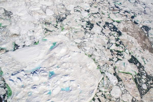 Aerial view of melting icepack and icebergs, Greenland (Kalaallit Nunaat), Arctic Ocean, climate