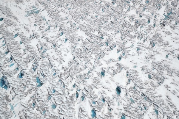 Aerial view of meltwater on the Greenland ice sheet, Arctic landscape, frozen wilderness, glaciers
