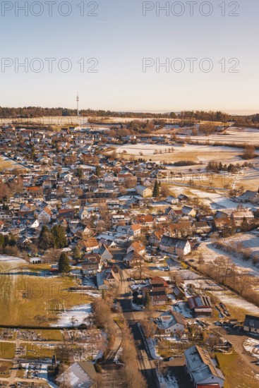 Winter village view with snow-covered roads and surrounding fields, Hallwangen, Freudenstadt