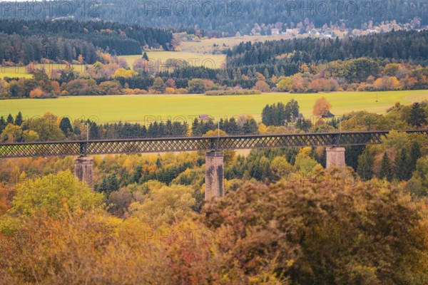 Bridge over an autumn landscape with colorful trees and meadows, Dornstetten, Freudenstadt