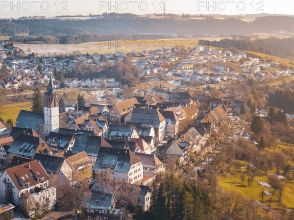 City view from the air with church and greenery, surrounded by rural landscape, Dornstetten,