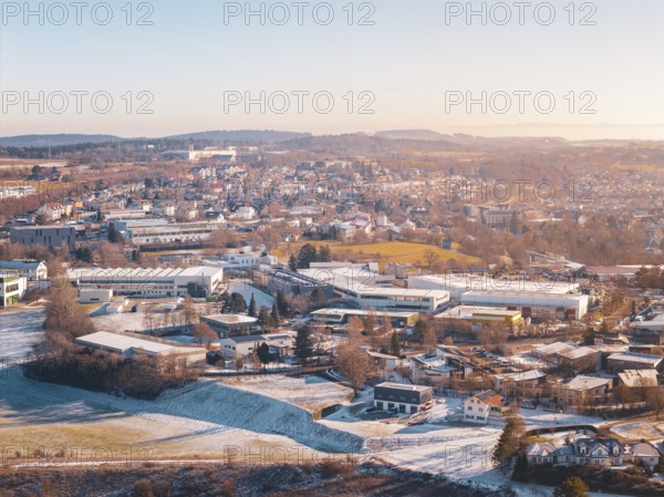 Cityscape in winter with various architectures and hills in the background, Dornstetten,