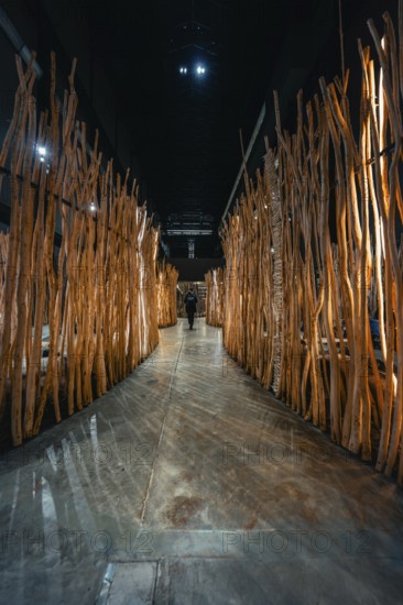 Oblong passage made of wooden bars in a modern art installation, Tate Modern of Art, Lodon, United