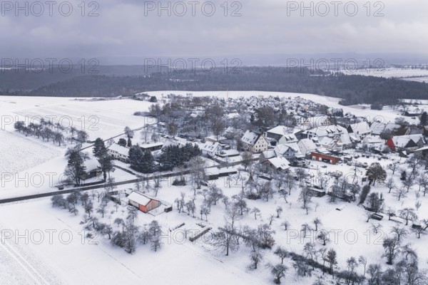 Wintery village landscape with snow-covered houses and trees, cold atmosphere, Wiesenstetten,