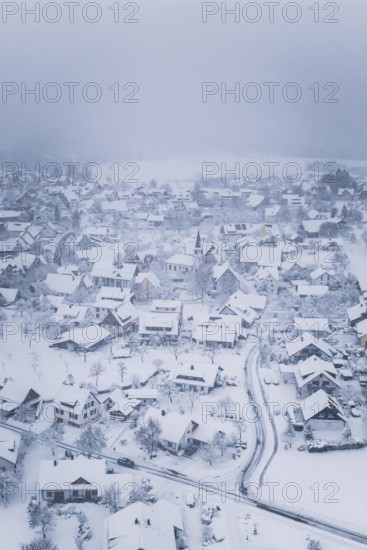 A wintry village with snow-covered houses and peaceful atmosphere, Schopfloch, Freudenstadt