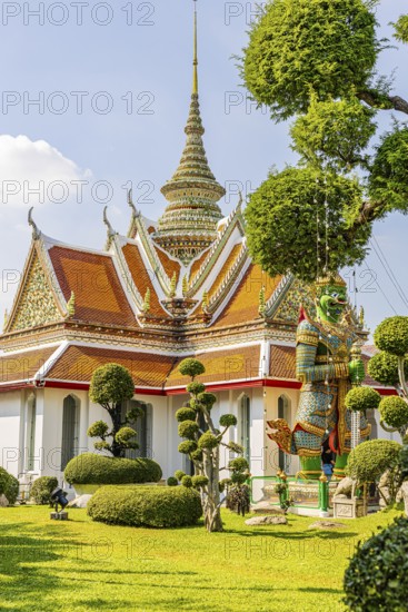 Wat Arun, Buddhist temple, overlapping roofs with curved chofas and Chedi temple tower, Bangkok,