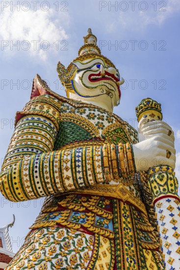 Mystical figure Yaksha as temple guard, Wat Arun Buddhist temple, Bangkok, Thailand's metropolis,