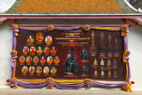 Panel with hierarchies of monks and Buddhas on the road to the Wat Arun Buddhist temple, Bangkok,