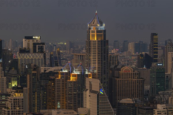Over the rooftops of Bangkok, evening light, view from the Moon Bar on the roof terrace of the