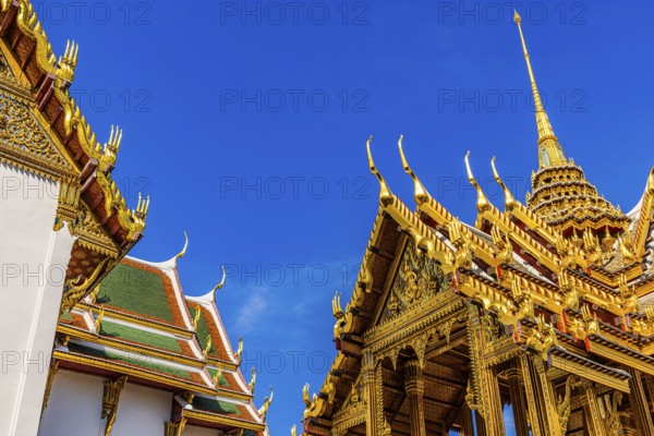 The Grand Royal Palace, the gilded Abhorn Bimok Pavilion with overlapping roofs and curved chofas,