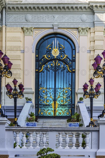 The Grand Royal Palace, side entrance with decorated gate and multi-armed lanterns, Chakri Maha