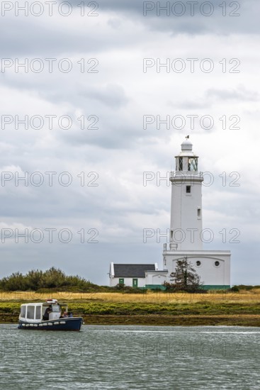Boats over Hurst Point Lighthouse and Hurst Castle, Hurst Spit, Milford on Sea, Lymington,