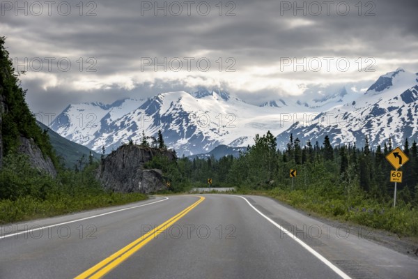 Road through mountain landscape, picturesque landscape with Worthington glacier, dramatic cloudy