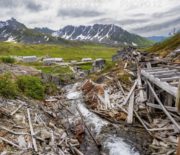 Crumbling mill and former Gold Mine Independence Mine building in mountainous landscape,